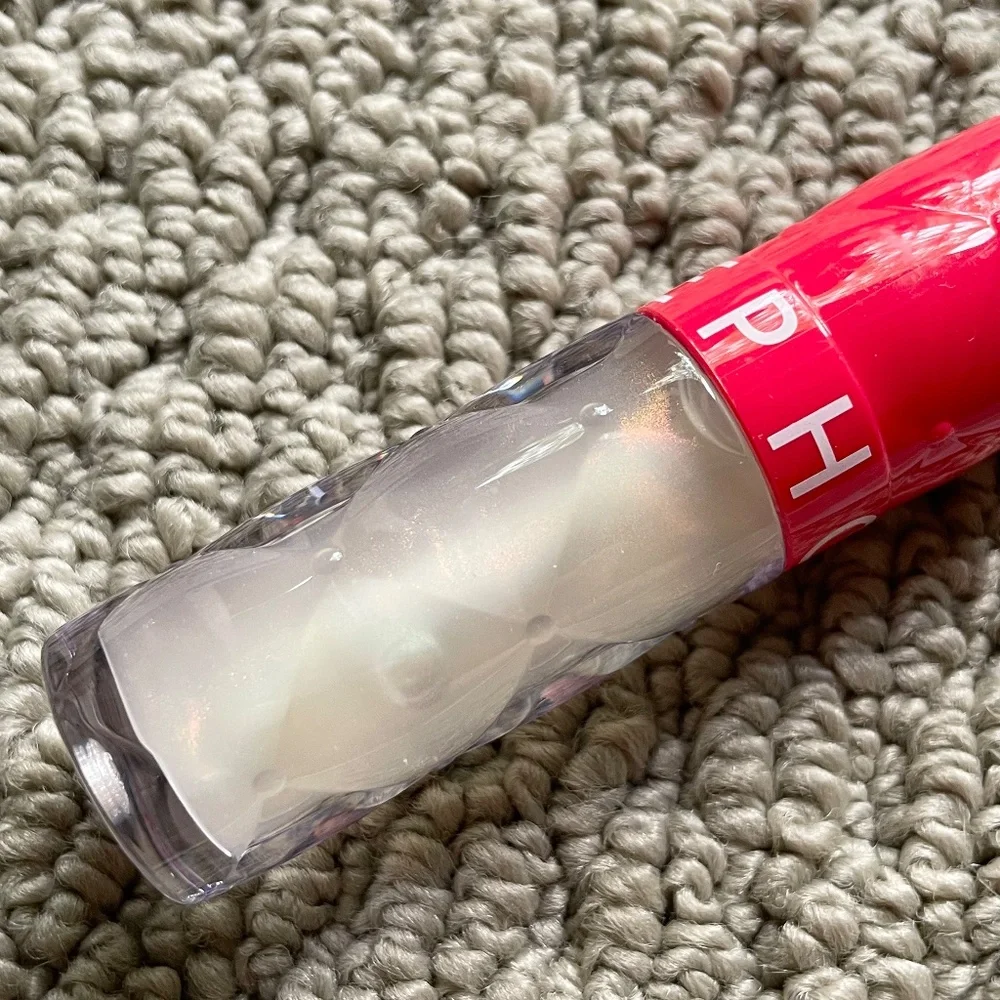Bundle of Sephora Outrageous Plump Hydrating Lip Gloss & Laura Mercier Eyshadow